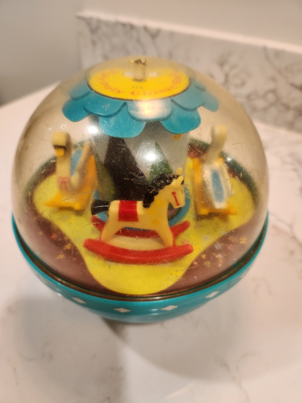 Fisher-Price Teal and Yellow Carousel Dome Toy